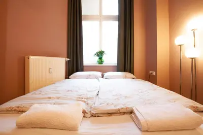 Ein Bett oder Betten in einem Zimmer der Unterkunft Atelier Centrál