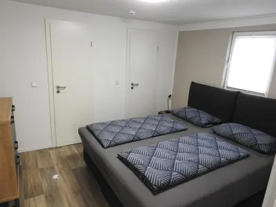 Ein Bett oder Betten in einem Zimmer der Unterkunft Alte Schmiede