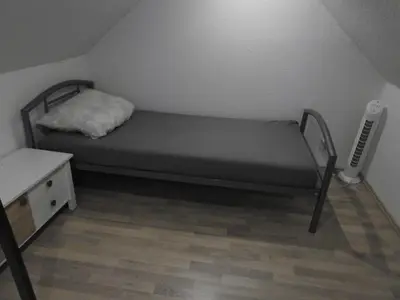 Ein Bett oder Betten in einem Zimmer der Unterkunft Alte Schmiede