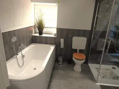 Ein Badezimmer in der Unterkunft alte Magd