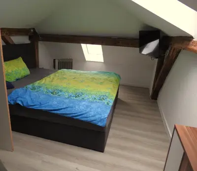 Ein Bett oder Betten in einem Zimmer der Unterkunft alte Magd