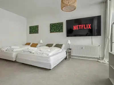 Ein Bett oder Betten in einem Zimmer der Unterkunft Studio nähe Volkspark Friedrichshain - 45 QM