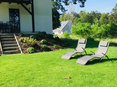 Ein Garten an der Unterkunft Röblinseeterrassen