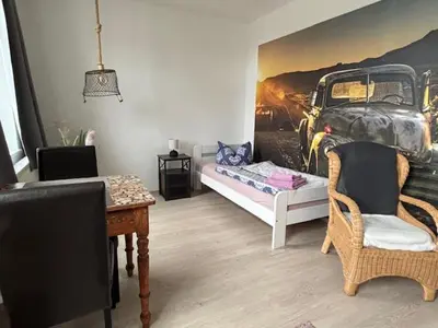 Ein Sitzbereich in der Unterkunft Ferienwohnung Zur alten Waage