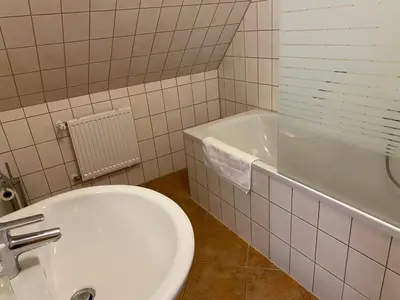 Ein Badezimmer in der Unterkunft Pension zum Zenshaus kleine Auszeit