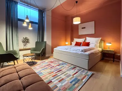 Ein Bett oder Betten in einem Zimmer der Unterkunft Schönhaus Prenzlauer Berg - Großzügiges Design-Apartment