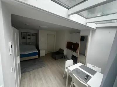 Ein Bett oder Betten in einem Zimmer der Unterkunft Gesundbrunnen Studio