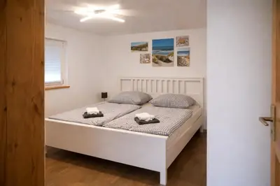 Ein Bett oder Betten in einem Zimmer der Unterkunft Ferienhaus Jamlitz