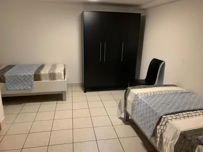 Ein Bett oder Betten in einem Zimmer der Unterkunft Ferienwohnung in Müncheberg