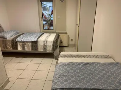 Ein Bett oder Betten in einem Zimmer der Unterkunft Ferienwohnung in Müncheberg
