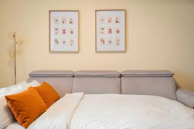 Ein Bett oder Betten in einem Zimmer der Unterkunft Design Loft am Hauptbahnhof - Modern mit Parkplatz