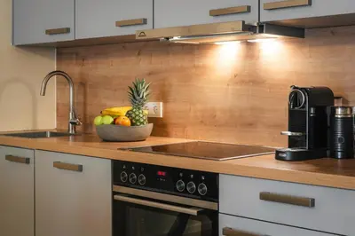 Küche/Küchenzeile in der Unterkunft Design Loft am Hauptbahnhof - Modern mit Parkplatz