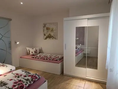 Ein Bett oder Betten in einem Zimmer der Unterkunft Spreewald Ferienwohnung Wollgast