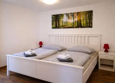 Ein Bett oder Betten in einem Zimmer der Unterkunft Ferienhaus Byhleguhre