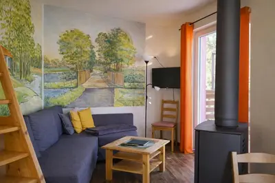 Ein Sitzbereich in der Unterkunft Ferienhaus Byhleguhre