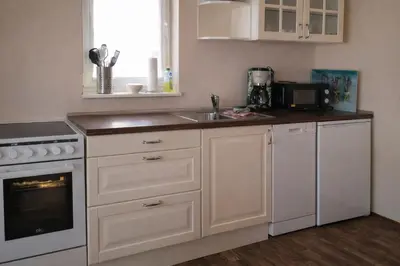Küche/Küchenzeile in der Unterkunft Ferienhaus Byhleguhre