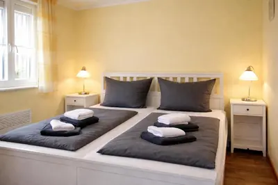 Ein Bett oder Betten in einem Zimmer der Unterkunft Ferienhaus Neu Zauche