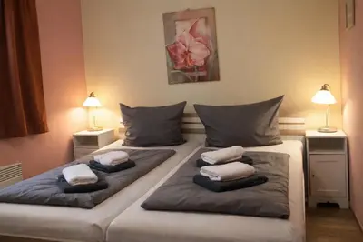 Ein Bett oder Betten in einem Zimmer der Unterkunft Ferienhaus Alt Zauche