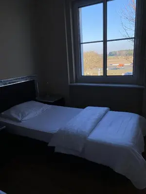 Ein Bett oder Betten in einem Zimmer der Unterkunft Tower Lodge