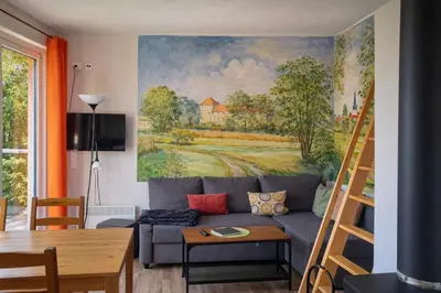 Ein Sitzbereich in der Unterkunft Ferienhaus Friedland
