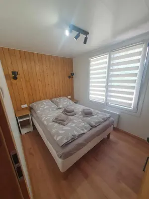 Ein Bett oder Betten in einem Zimmer der Unterkunft Tiny Haus 1