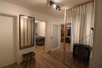 Ein Bett oder Betten in einem Zimmer der Unterkunft Apartment Grey am See mit Zugang