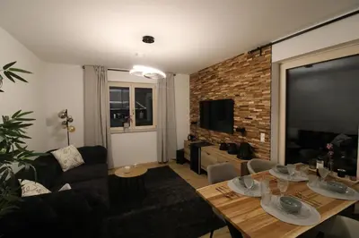 TV/Unterhaltungsangebot in der Unterkunft Apartment Grey am See mit Zugang