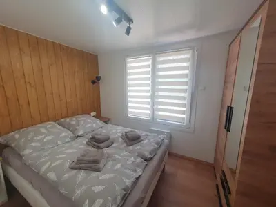 Ein Bett oder Betten in einem Zimmer der Unterkunft Tiny Haus 2