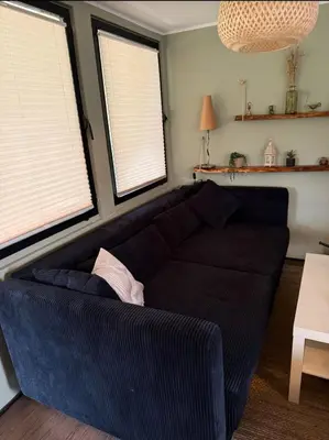 Ein Sitzbereich in der Unterkunft Ferienhaus Garten und Pool Ferienwohnung und Gästehaus