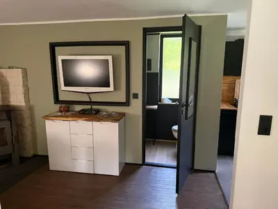 TV/Unterhaltungsangebot in der Unterkunft Ferienhaus Garten und Pool Ferienwohnung und Gästehaus