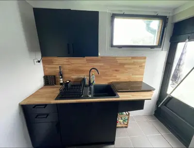 Küche/Küchenzeile in der Unterkunft Ferienhaus Garten und Pool Ferienwohnung und Gästehaus