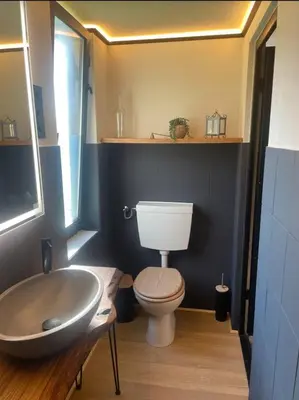 Ein Badezimmer in der Unterkunft Ferienhaus Garten und Pool Ferienwohnung und Gästehaus
