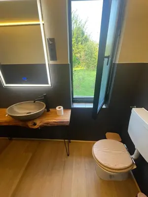 Ein Badezimmer in der Unterkunft Ferienhaus Garten und Pool Ferienwohnung und Gästehaus