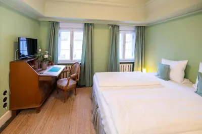 Ein Bett oder Betten in einem Zimmer der Unterkunft Landhaus am Jungfernsee