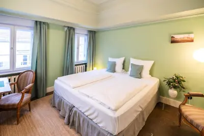 Ein Bett oder Betten in einem Zimmer der Unterkunft Landhaus am Jungfernsee
