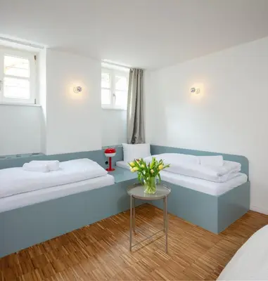 Ein Bett oder Betten in einem Zimmer der Unterkunft Family Friendly Studio Apartment