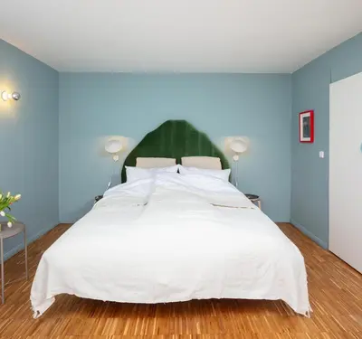 Ein Bett oder Betten in einem Zimmer der Unterkunft Family Friendly Studio Apartment