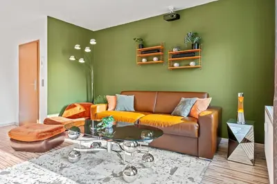 Ein Sitzbereich in der Unterkunft 3 Zimmer, Beamer, Balkon, Disney Plus