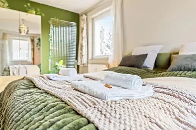 Ein Bett oder Betten in einem Zimmer der Unterkunft 3 Zimmer, Beamer, Balkon, Disney Plus