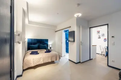 Ein Bett oder Betten in einem Zimmer der Unterkunft Cozy hideaway in Kreuzberg