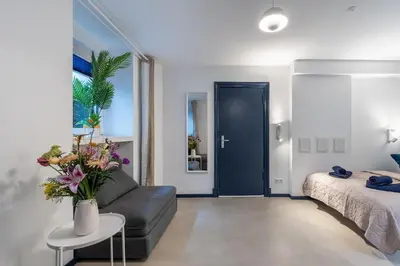 Ein Bett oder Betten in einem Zimmer der Unterkunft Cozy hideaway in Kreuzberg