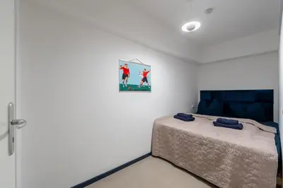 Ein Bett oder Betten in einem Zimmer der Unterkunft Modern Flat in Kreuzberg 2 bath rooms