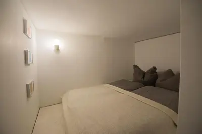 Ein Bett oder Betten in einem Zimmer der Unterkunft Urban Apartment Friedrichshain Boxhagenerstraße