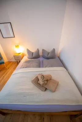 Ein Bett oder Betten in einem Zimmer der Unterkunft Urban Apartment Friedrichshain Boxhagenerstraße