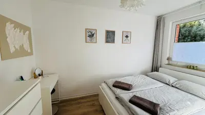 Ein Bett oder Betten in einem Zimmer der Unterkunft Berliner Vorstadtperle