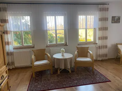 Ein Sitzbereich in der Unterkunft Pension zum Zenshaus große Auszeit
