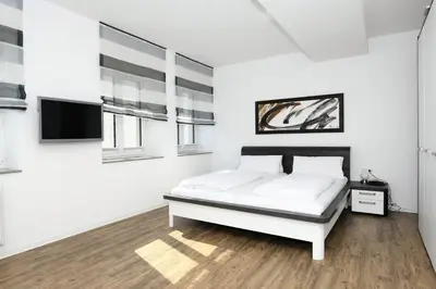 Ein Bett oder Betten in einem Zimmer der Unterkunft Ferienwohnung Helene