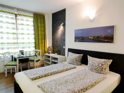 Ein Bett oder Betten in einem Zimmer der Unterkunft Apartments Rummelsburger Bucht am Ostkreuz