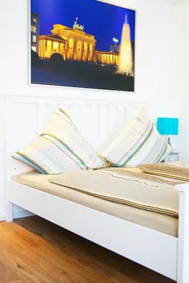 Ein Bett oder Betten in einem Zimmer der Unterkunft Apartments Rummelsburger Bucht am Ostkreuz