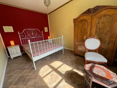 Ein Bett oder Betten in einem Zimmer der Unterkunft Gutshaus Sonnenburg